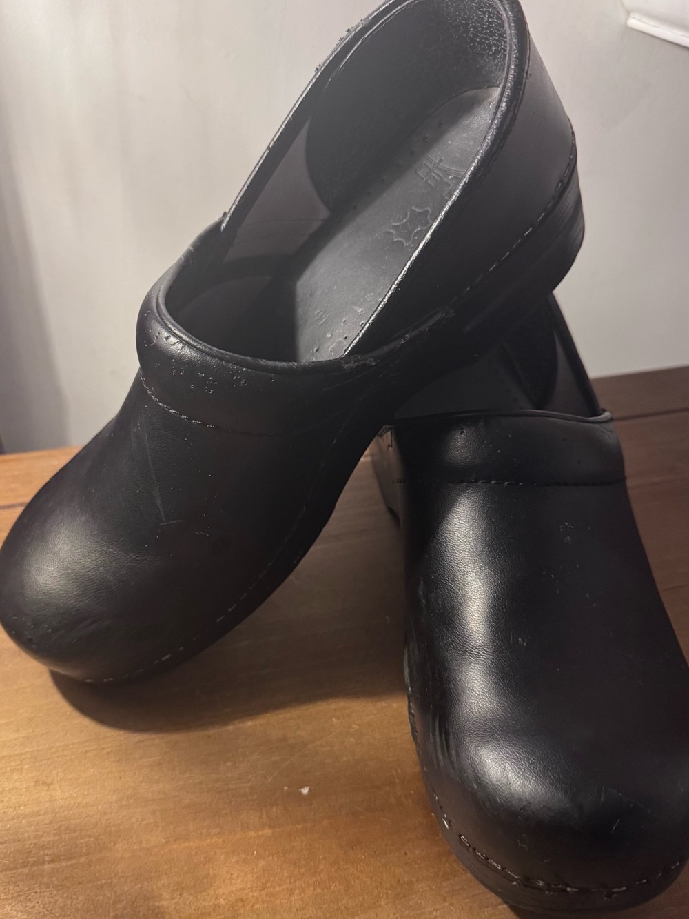 Dansko Black Leather Slip-On Clogs